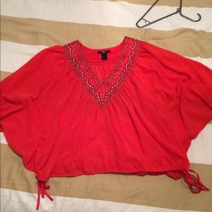 Black brand, sheer top